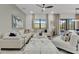 Spacious living room with sectional sofa and plenty of natural light at 6133 High Seas Dr, Orlando, FL 32821