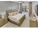 Spacious main bedroom with wood furniture and large windows at 6133 High Seas Dr, Orlando, FL 32821