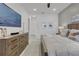Main bedroom with large dresser, king-size bed and TV at 6133 High Seas Dr, Orlando, FL 32821
