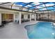 Inviting pool and spa with covered patio and seating at 6133 High Seas Dr, Orlando, FL 32821