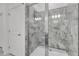 Large walk-in shower with gray marble tile at 6133 High Seas Dr, Orlando, FL 32821