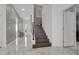 Modern staircase with dark wood steps and metal railing at 6133 High Seas Dr, Orlando, FL 32821