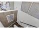 Modern staircase with wood steps and wall art at 6133 High Seas Dr, Orlando, FL 32821