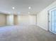 Large bonus room with carpet, double door closets, and exterior access at 705 Beverly Ave, Altamonte Springs, FL 32701