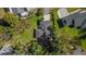 Overhead view of the house and surrounding landscape at 8 Pine Ct, Yalaha, FL 34797