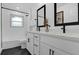 Clean bathroom with double vanity and modern fixtures at 8 Pine Ct, Yalaha, FL 34797