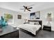 Spacious primary bedroom with modern decor and a large bed at 8 Pine Ct, Yalaha, FL 34797