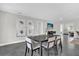 Dining area with modern table and chairs at 8 Pine Ct, Yalaha, FL 34797