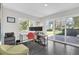 Bright home office with plenty of natural light and backyard access at 8 Pine Ct, Yalaha, FL 34797