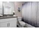 Clean bathroom with a tub and shower combination at 8940 Play Through Dr, Davenport, FL 33896