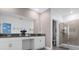 Double vanity bathroom with a large shower at 8940 Play Through Dr, Davenport, FL 33896
