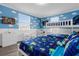 Toy Story themed bedroom with bunk beds and full bed at 8940 Play Through Dr, Davenport, FL 33896