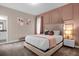 Spacious bedroom with stylish decor and a comfortable bed at 8940 Play Through Dr, Davenport, FL 33896