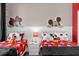 ' bedroom with a Mickey Mouse theme and twin beds at 8940 Play Through Dr, Davenport, FL 33896