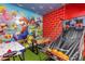 Fun game room with air hockey, foosball, and basketball game at 8940 Play Through Dr, Davenport, FL 33896