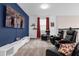 Game room with large TV, comfortable seating, and themed decor at 8940 Play Through Dr, Davenport, FL 33896