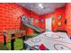 Game room with air hockey, foosball and basketball game at 8940 Play Through Dr, Davenport, FL 33896