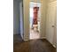 View of a bathroom with shower, toilet and bookcase at 1111 South St, Eustis, FL 32726