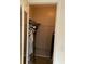 Well-lit closet with hanging rods and a shelf for storage at 1111 South St, Eustis, FL 32726