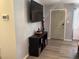 Inviting entryway with built-in shelving and a smart lock at 1111 South St, Eustis, FL 32726