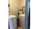 Laundry room with washer, dryer and water heater at 1111 South St, Eustis, FL 32726