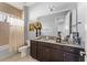 Elegant bathroom featuring a granite countertop and updated fixtures at 13219 Stanthorne Ave, Orlando, FL 32832