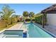 Resort-style pool with spa and pergola at 13219 Stanthorne Ave, Orlando, FL 32832