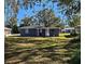 House with large backyard, mature trees, and great curb appeal at 1503 33Rd Nw St, Winter Haven, FL 33881