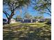 House with large backyard, mature trees, and great curb appeal at 1503 33Rd Nw St, Winter Haven, FL 33881