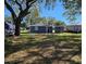 House with large backyard, mature trees, and great curb appeal at 1503 33Rd Nw St, Winter Haven, FL 33881