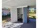 Covered carport with storage room and water heater at 1503 33Rd Nw St, Winter Haven, FL 33881