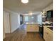 Modern kitchen with white cabinets and stainless steel appliances at 1503 33Rd Nw St, Winter Haven, FL 33881