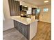 Modern kitchen with white cabinets and a quartz countertop at 1503 33Rd Nw St, Winter Haven, FL 33881