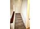 Carpeted staircase leading to the second floor at 154 Lago Vista Blvd, Casselberry, FL 32707