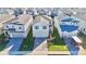 An aerial view of a neighborhood with houses and landscaping at 16230 Trinidad Way, Clermont, FL 34714