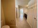 Bathroom with tile flooring, shower, and double vanity at 16230 Trinidad Way, Clermont, FL 34714