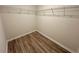 Walk-in closet complete with wire shelving at 16230 Trinidad Way, Clermont, FL 34714