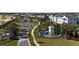 Community entrance with landscaping and signage at 16230 Trinidad Way, Clermont, FL 34714