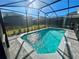 Refreshing screened-in pool with backyard view at 16230 Trinidad Way, Clermont, FL 34714