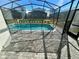 Private screened-in pool with safety fence at 16230 Trinidad Way, Clermont, FL 34714