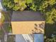 Aerial view of a house roof with solar panels and surrounding yard at 2141 Camellia Dr, Longwood, FL 32779