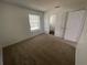 Bright bedroom with carpeted floor and a window at 2355 Cypress Rd, Deland, FL 32724