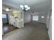 Kitchen with light-colored cabinets and vinyl flooring at 2355 Cypress Rd, Deland, FL 32724