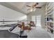 Bright loft with built-in bookshelves, piano, and French doors at 2812 Summer Brooke Way, Casselberry, FL 32707