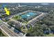 Aerial view showcasing a house and a lake in a residential area at 3207 Stratton Cir, Kissimmee, FL 34744