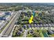 Aerial view of a house nestled in a quiet residential neighborhood at 3207 Stratton Cir, Kissimmee, FL 34744