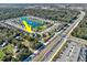 Community overview, featuring a lake and numerous houses at 3207 Stratton Cir, Kissimmee, FL 34744
