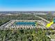 Community overview, showcasing a lake and various homes at 3207 Stratton Cir, Kissimmee, FL 34744