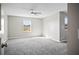 Large bedroom with window and ceiling fan at 3207 Stratton Cir, Kissimmee, FL 34744