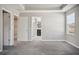 Bright bedroom with carpet, window, and ensuite access at 3207 Stratton Cir, Kissimmee, FL 34744